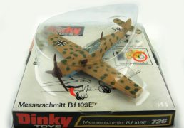 Dinky No.726 Messerschmitt BF109E - desert camouflage, light brown/green, cross decals to wings, brown propeller - Mint in Good Plus to Excellent, slightly age discoloured bubble pack box with unused decal sheet and both instruction leaflets.