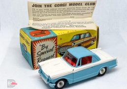 Corgi 231 Triumph Herald Coupe - two-tone blue, white, red interior, silver trim, spun hubs - Mint a beautiful example in a Good Plus blue and yellow carded picture box with collectors club folded leaflet.