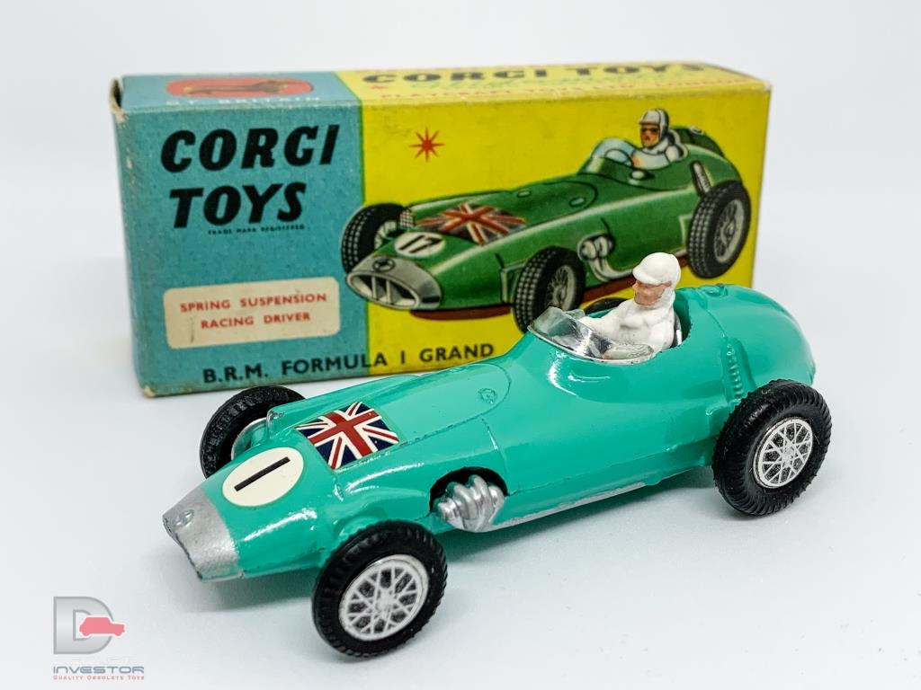 Corgi No.152S BRM Formula 1 Grand Prix Racing Car - turquoise body & base with silver nose and exhaust, racing number 1 and Union Jack nose decals, silver interior with driver figure, flat spun hubs which have had accessory pack adhesive spoked hubs applied - Near mint aside from a small touch in on rear of body and in generally good plus blue and yellow box.