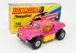 Matchbox Superfast 30b Beach Buggy - metallic candy pink with medium splatter of yellow spots, clear windows, dark yellow interior, chrome engine with large exhausts, bare metal base, spiro wheels - Mint in Good Plus type I box without "New".