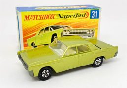 Matchbox Superfast 31c Lincoln Continental (Superfast 31a) - metallic lime green body with low arches, clear windows held by punched rivet, ivory interior, bare metal base, small diameter solid 5-spoke narrow wheels - Near Mint with usual small factory assembly mark below rear window in Near Mint "New" type G box with "TM" and matching model artwork.