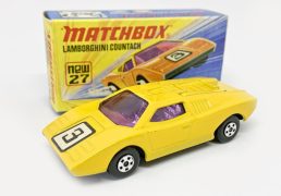 Matchbox Superfast 27e Lamborghini Countach (Superfast 27b) - yellow body with racing number 3 nose label, purple windows, chrome interior, matt black base, 5-spoke wheels - Mint in Near Mint "New" type I box with matching model artwork. Rare Variation.