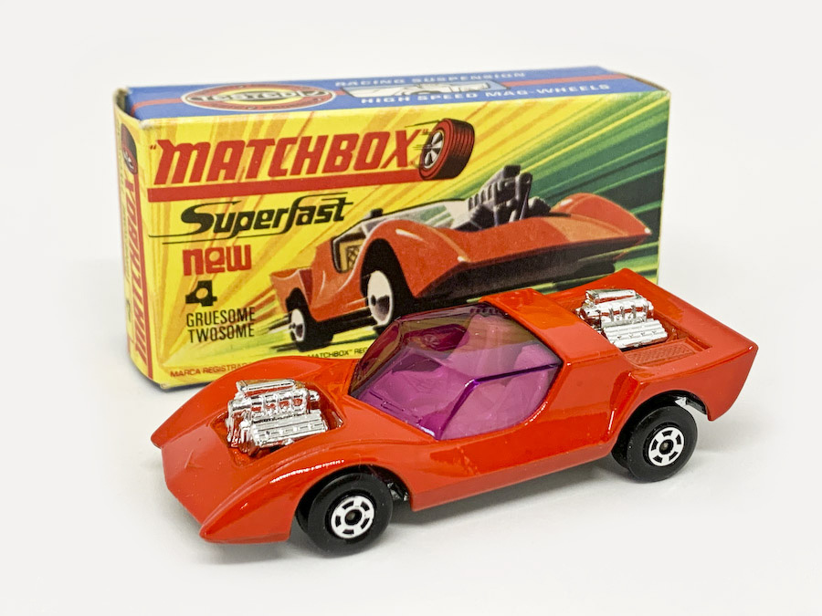 Matchbox Superfast 4e Gruesome Twosome (Superfast 4b) - burnt orange body, purple windows, pale yellow interior, bare metal base, 5-spoke wide wheels - Mint in Excellent "New" type I box.