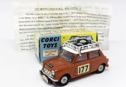 Corgi No.339 BMC Mini Cooper S "Rallye Monte Carlo" - red including interior, white roof, small touch in under roof rack, chrome roof-rack with 2 x spare cast hubs, racing number 177 - Very near mint, superb example in Excellent plus blue and yellow carded picture box with correct flash. Also comes with the correct model club leaflet featuring the history of the mini and the rally.