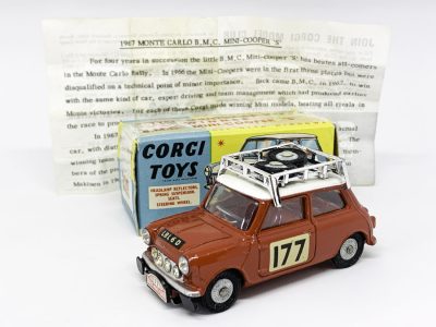 Corgi No.339 BMC Mini Cooper S "Rallye Monte Carlo" - red including interior, white roof, small touch in under roof rack, chrome roof-rack with 2 x spare cast hubs, racing number 177 - Very near mint, superb example in Excellent plus blue and yellow carded picture box with correct flash. Also comes with the correct model club leaflet featuring the history of the mini and the rally.