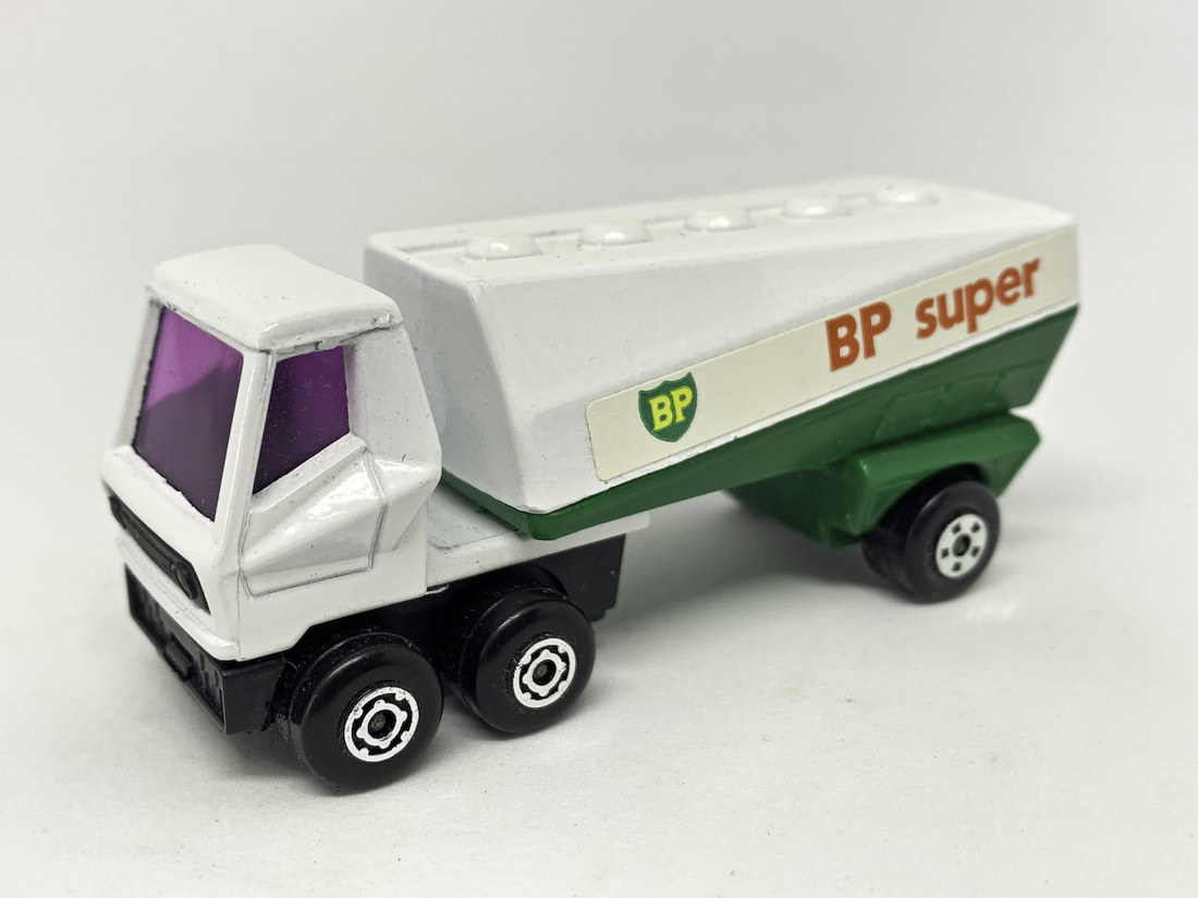 Matchbox Superfast No.63b Freeway Gas Tanker "BP Super" - white tractor unit with purple windows, black plastic base, dark green trailer with rear hole, white tank, clip-fit black plastic rear axle clip with parallel line design - Mint Condition.