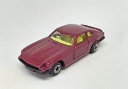 Matchbox Superfast No.67d Datsun 260Z (Superfast 67c) - metallic magenta body, clear windows, vivid yellow interior, matt black base, dot-dash wheels - Near mint condition, unboxed.