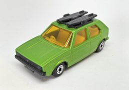 Matchbox Superfast No.7 Volkswagen Golf amber windows, dark yellow interior, matt black base, metallic emerald green body - Mint, unboxed.