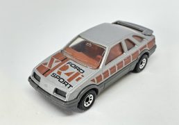 Matchbox Superfast No.55 Ford Sierra RX4i (Superfast 55e) - both are clear windows, red interior, grey made in England base, 8-dot wheels. Near mint, unboxed.
