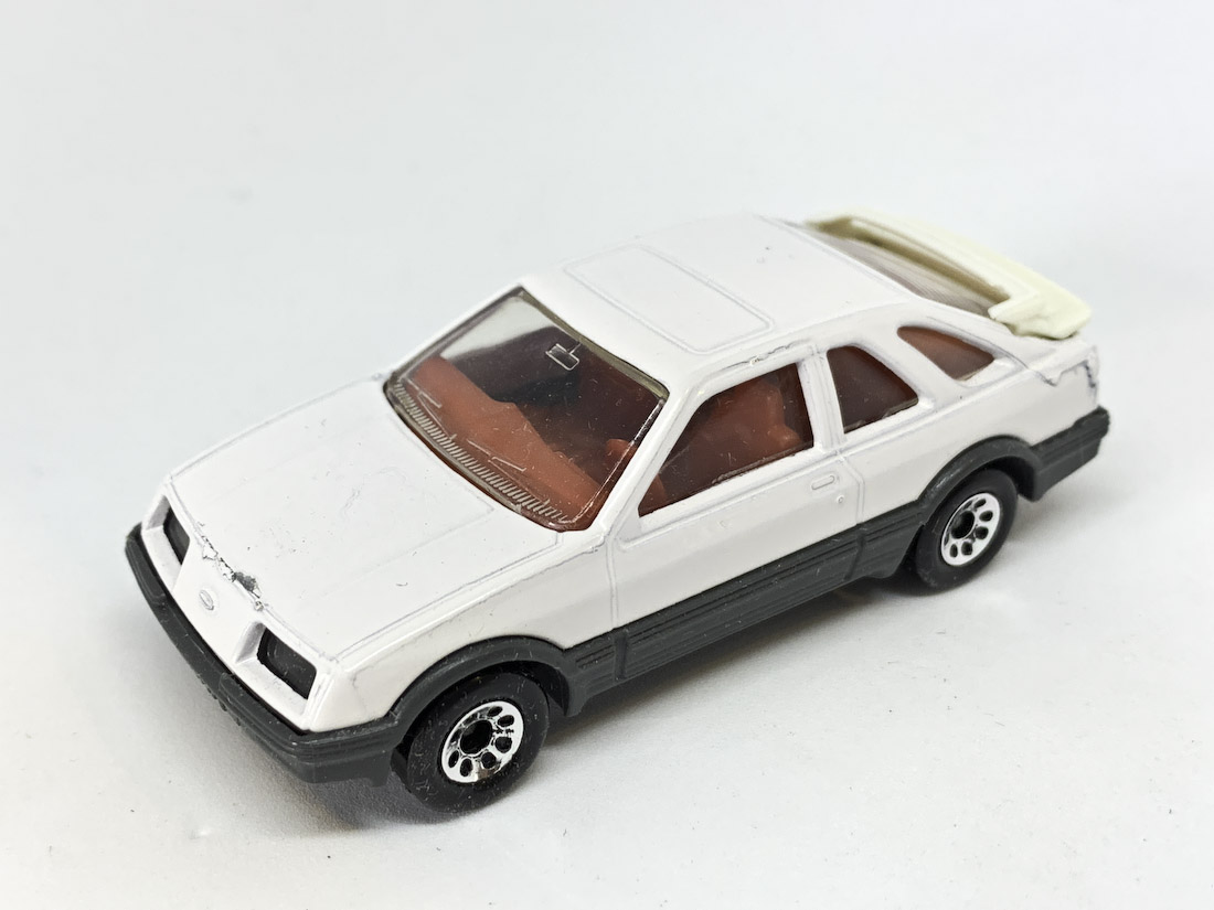 Matchbox Superfast No.55 Ford Sierra RX4i (Superfast 55e) - white body, clear windows, red interior, made in England base, 8-dot wheels. Excellent plus condition, unboxed.