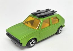 Matchbox Superfast No.7 Volkswagen Golf amber windows, dark yellow interior, matt black base, metallic emerald green body - Mint, unboxed.