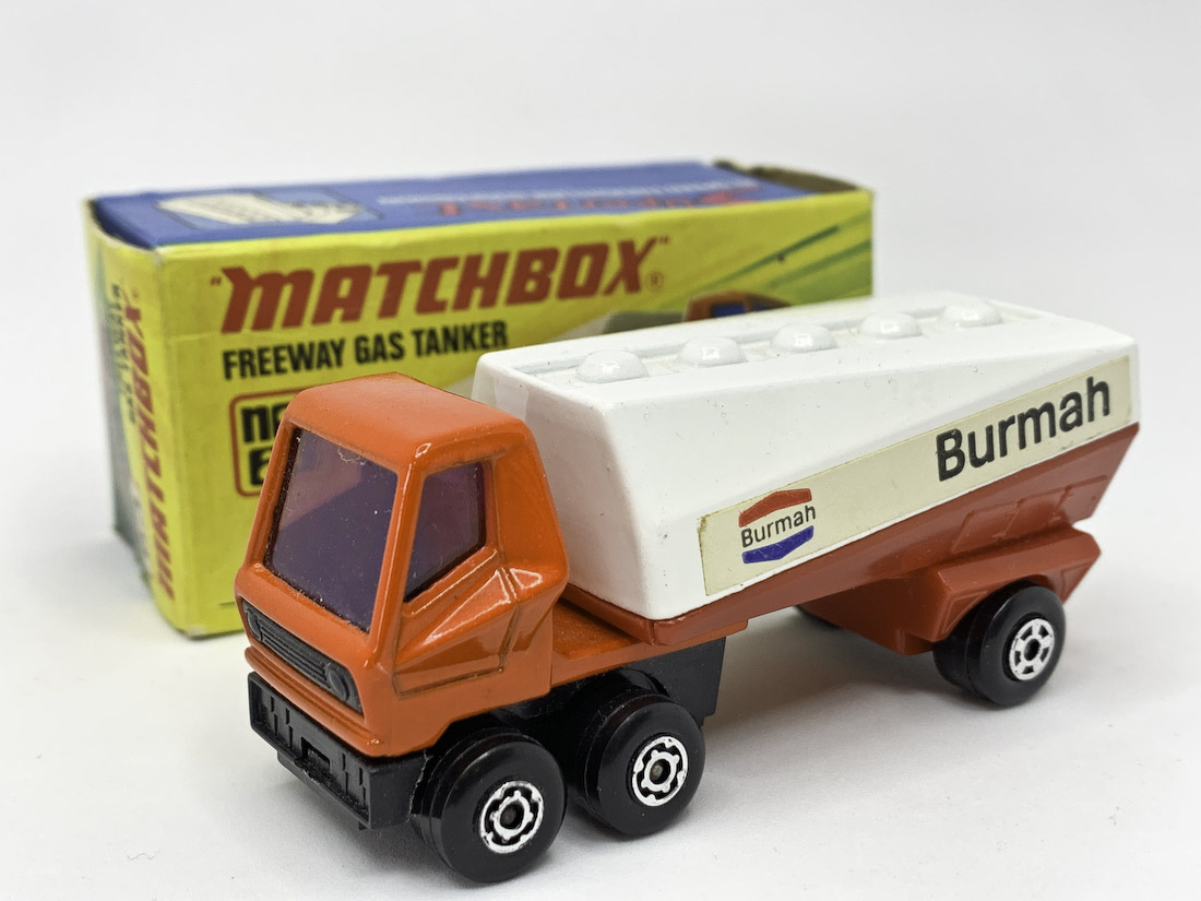 Matchbox Superfast No.63b Freeway Gas Tanker "Burmah" - burnt orange tractor unit with purple windows, black plastic base, Maltese Cross wheels, red trailer with rear hole, black clip-fit rear axle clip with arrow design - Excellent Plus in Excellent Plus type I box.